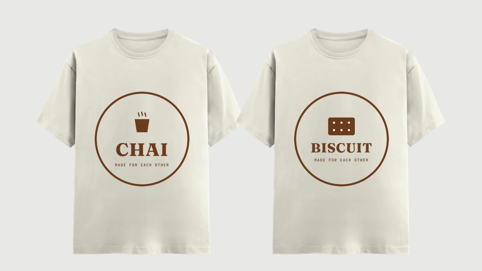 Two off-white pair tees laid flat side by side, one printed CHAI and the other BISCUIT in matching badge type